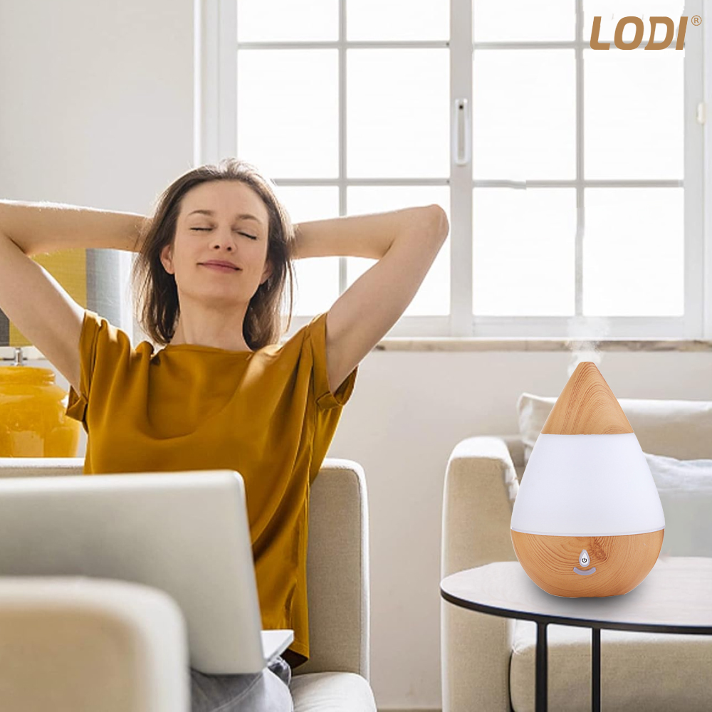 Difuzor Aromaterapie Lodi214, 7 culori LED, lumini dinamice, buton on/off, capacitate 235ml, silentios, umidifica aerul, stejar deschis
