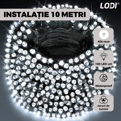 Instalatie de Craciun Liniara cu Panou Solar Lodi1459, 10 m, 8 jocuri de lumini, alimentare la priza, fir verde, interior/exterior, rezistenta la apa, 100 LED-uri, alb rece